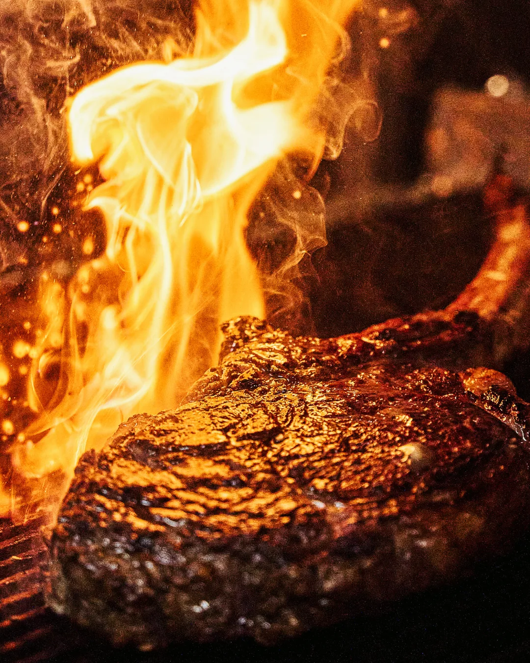 Tomahawk steak at STK Niagara Falls, fire-finished bone-in cut
